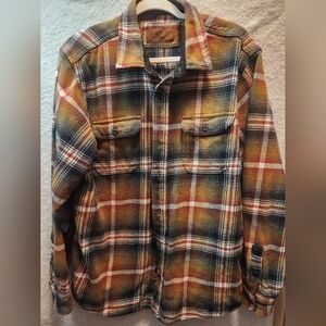 Orvis shirt Men's size large orange flannel  in a multi-color plaid pattern